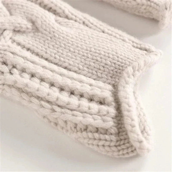 Consuelo - Jersey trenzado cuello alto