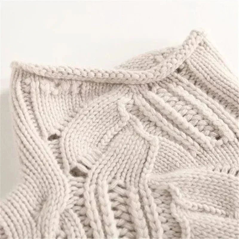 Consuelo - Jersey trenzado cuello alto