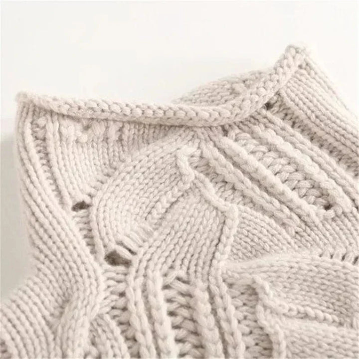 Consuelo - Jersey trenzado cuello alto