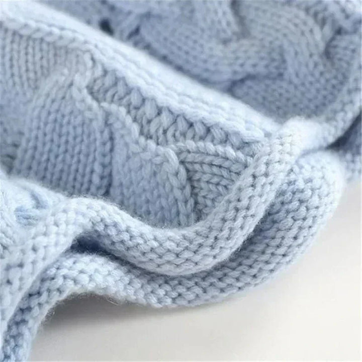 Consuelo - Jersey trenzado cuello alto