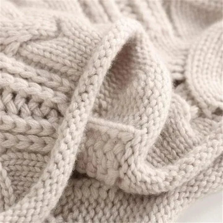Consuelo - Jersey trenzado cuello alto